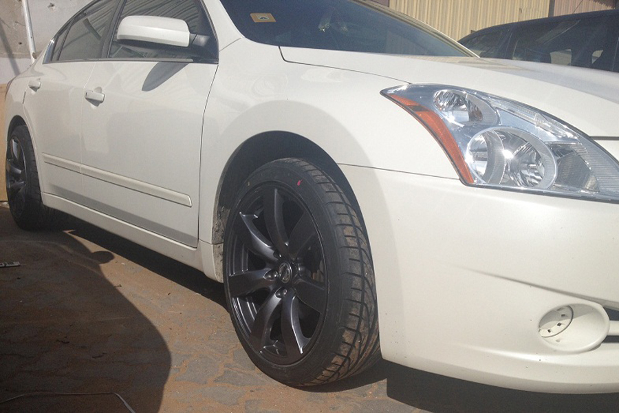 nissan altima with 18 inch gtr style smoked wheels